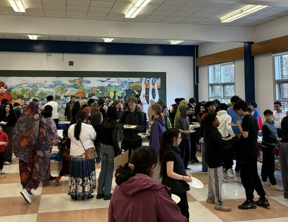 Families gather at the 'Taste of Cultures' Potluck at Brookfield HS.
