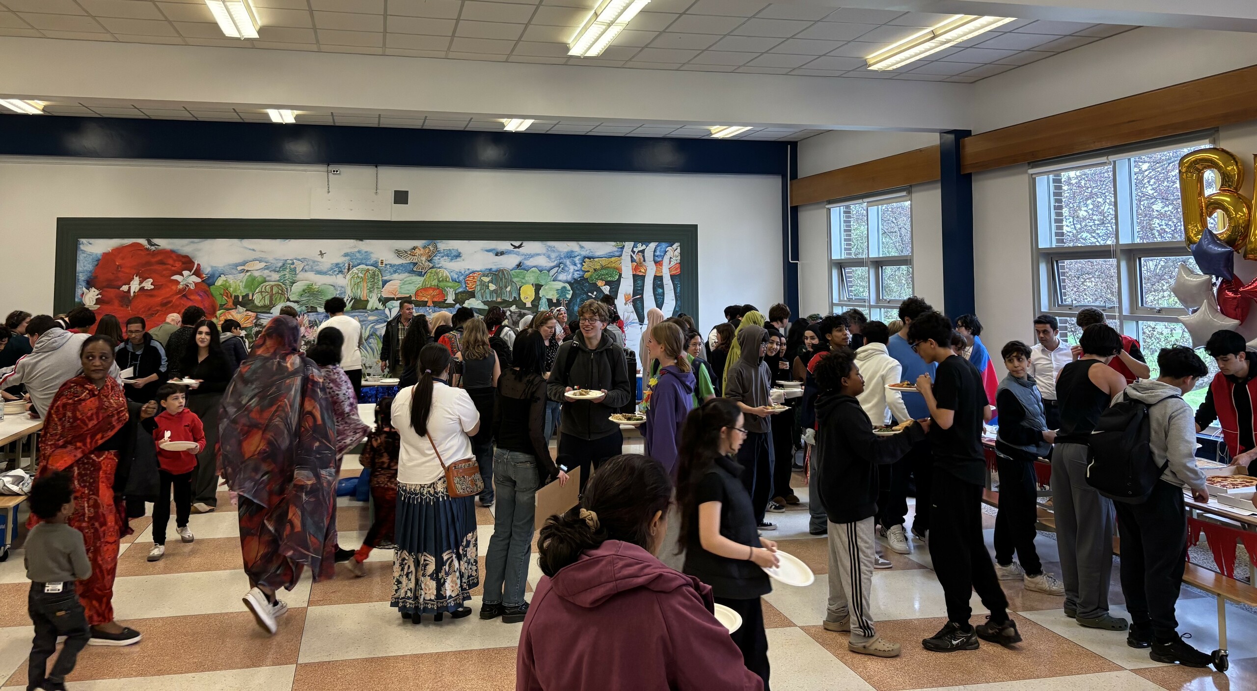 Families gathered at the 'Taste of Cultured' Potluck at Brookfield High School.