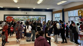 Families gathered at the 'Taste of Cultured' Potluck at Brookfield High School.