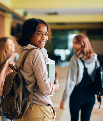 students walking in hallway to class