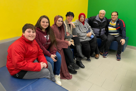 a group of students and family members celebrating the Iftar at Summerside School